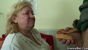 Big-busted granny tastes scrumptious load of shit
